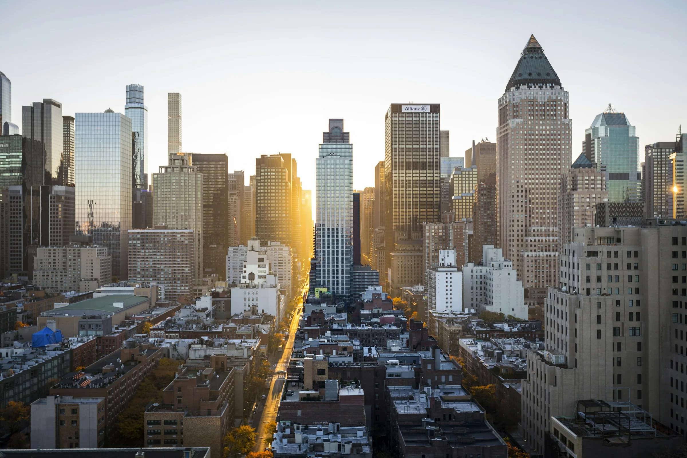 A city skyline at sunrise